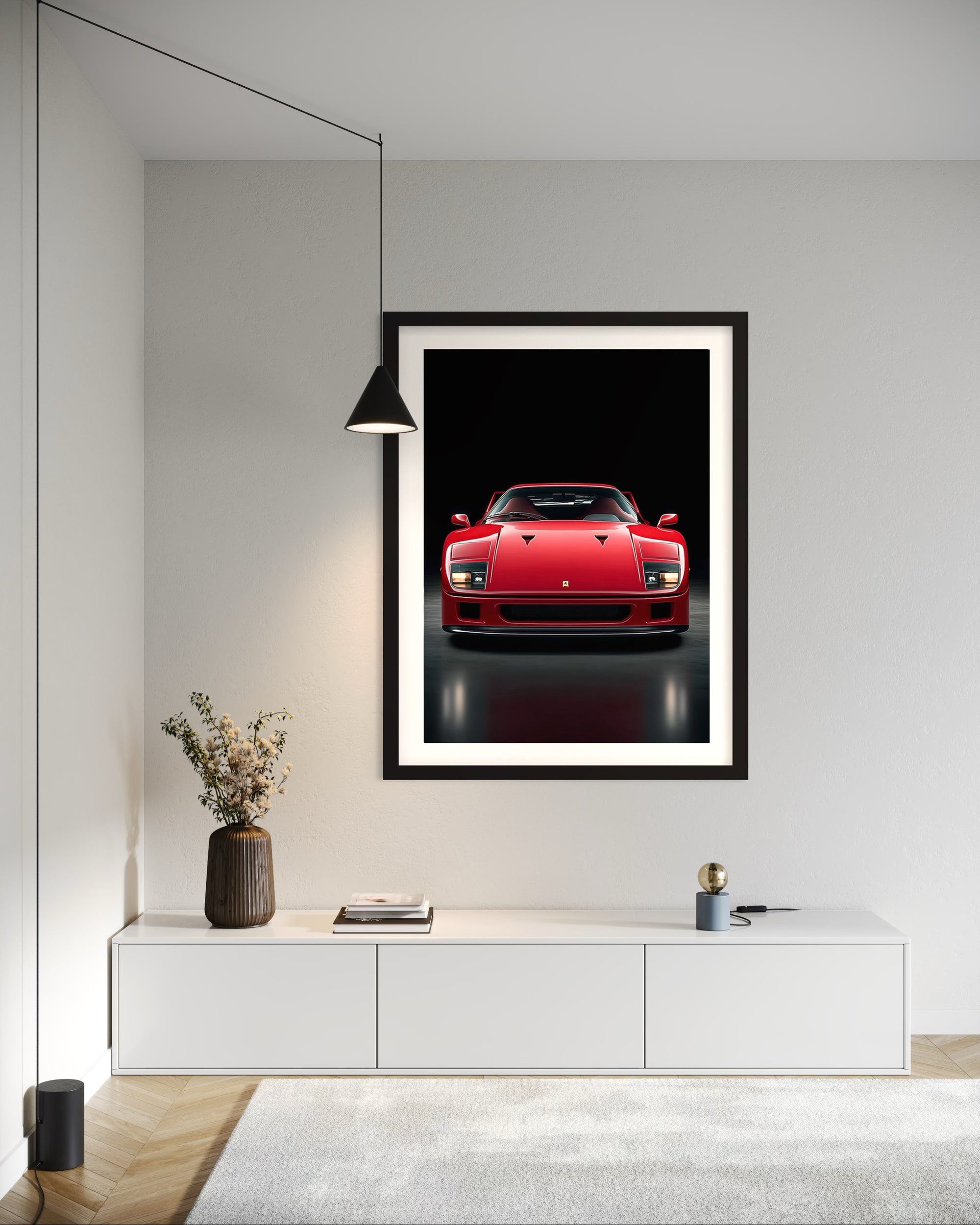 Framed artwork of a red  sports Ferrari F40 car on a wall in a modern interior setting.