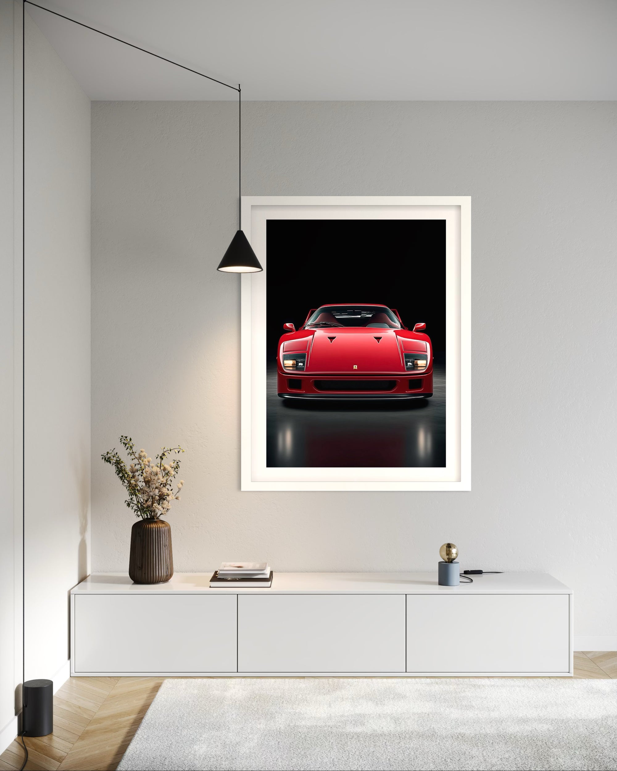 Framed artwork of a red Ferrari F40 sports car on a wall in a modern interior setting.